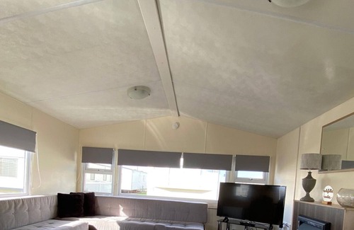 Rhyl Cabina | Caravan With Decking at Lyons Robinhood
