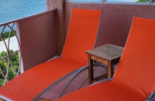 Cotton Valley Condominio | Caribbean Breeze Condo - hilltop breezes, views, convenience to beach & more!