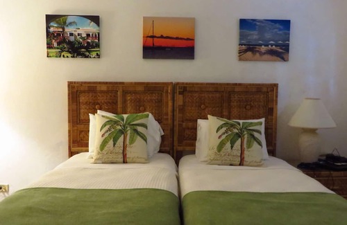 West End Village Hotel | Caribbean Getaway | Room w/ Full Kitchen & Patio | Steps Away from the Beach