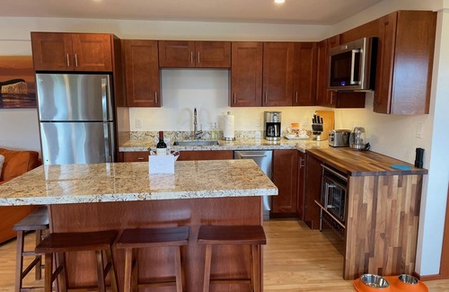 Northeast Carmel Casa | Carmel Big Sur-Style Guest House with Hot Tub, bank of windows, decks & VIEWS!