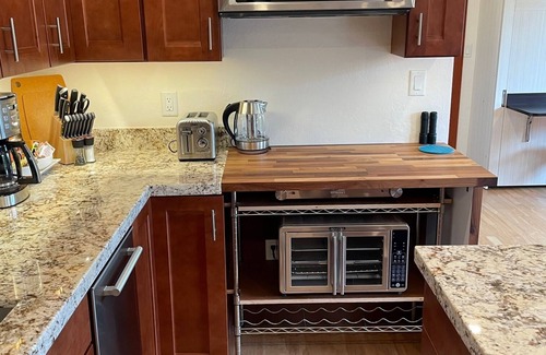 Northeast Carmel Casa | Carmel Big Sur-Style Guest House with Hot Tub, bank of windows, decks & VIEWS!