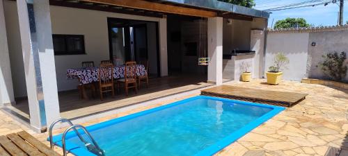 Ribeirao Preto Casa | Casa 3 quartos climatizados, wi-fi, garagem e área de lazer com piscina