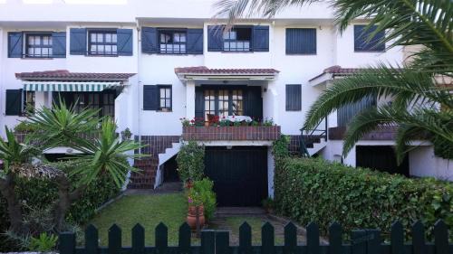 Gozon Casa | Casa adosada playa Verdicio