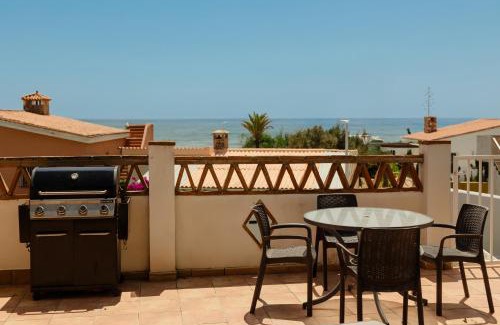 Urbanizacion Costabella Casa | Casa Azura - Beachfront with Private Terrace, Garden, BBQ, and Garage in Marbella