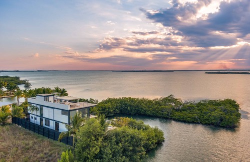 Placentia Villa | Casa Balam, A Stunning Waterfront Villa, w/Boat, 40ft Pool & Rooftop Bar