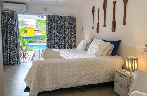 Arraial d'Ajuda Hotel | Casa Brisa - WIFI; PISCINA e Café da Manhã a 520m do Centro de Arraial