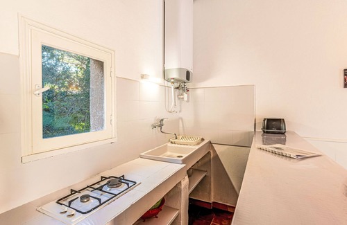 Santa Giulia Casa | Casa Cala Rossa by Interhome