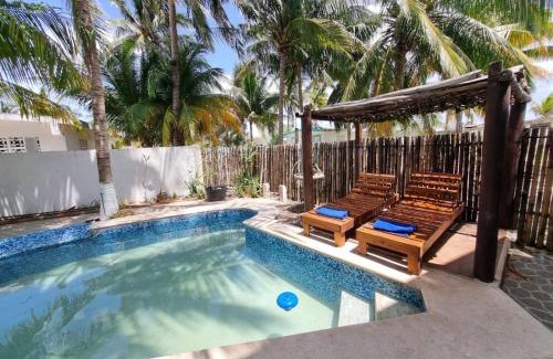 Chuburná Puerto Apartamento | Casa Columpios, con alberca a pasos de la playa
