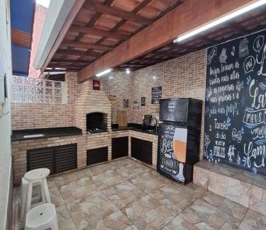 Raul Cury Casa | Casa com churrasqueira e piscina