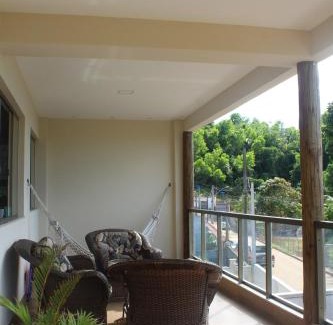 Iriri Casa | Casa com mezanino, de frente para o mar