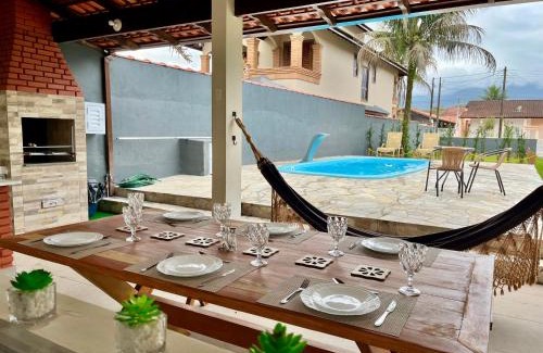 Balneario Mogiano Casa | Casa com piscina 500m da praia condomínio Morada da Praia