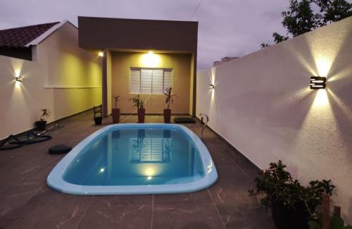 Guaratuba Casa | Casa com piscina , ar condicionado e churrasqueira no balneário Eliana