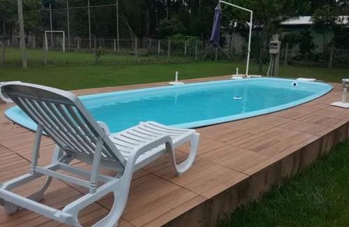 Torres Casa | Casa com piscina e salão de jogos para aluguel de temporada e finais de semana em Torres/RS.