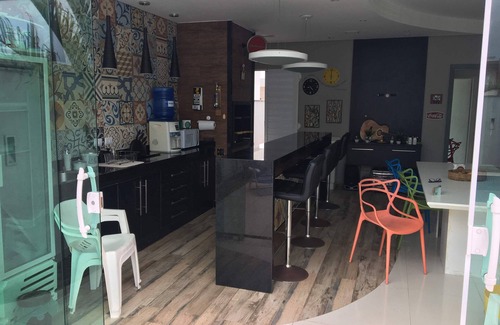Tupy Casa | Casa com Piscina em Condomínio Fechado com Segurança 24h de Frente Para o mar
