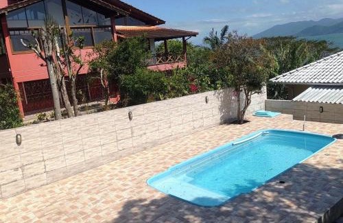 Caiacanga Casa | Casa com piscina vista mar por do sol