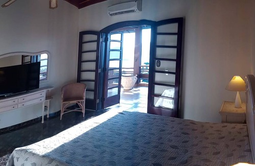 Itaquanduba Casa | Casa com vista privilegiada do mar em Ilhabela/SP