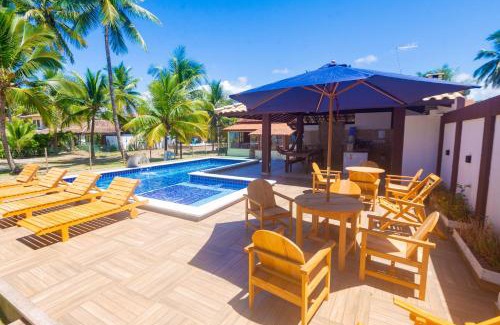 Olivenca Apartamento | Casa completo com grande piscina sob coqueiros, pe na areia