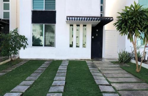 Cancún Casa | Casa con alberca y jardín en Cancún