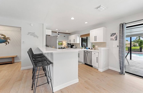 Cape Coral Casa | Casa de Crab: Gulf Access Waterfront 4 Bedroom and 3 Bathroom Home Heated Pool