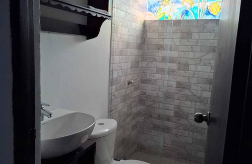 Pie de Popa Casa | Casa hotel colonial doña Elena-Habitación Mar Azul,con baño privado y cama doble