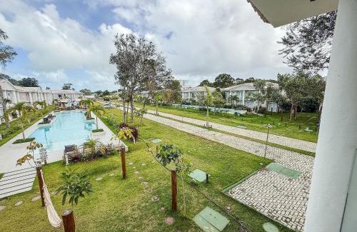 Arraial d'Ajuda Casa | Casa em condomínio a 200m da praia em Arraial D'ajuda, com 3 suites, sala climatizada, área gourmet privativa, Internet 300MBPS, condomínio com piscinas adulto e infantil, sauna, quadra de beach tenis e portaria 24hrs.