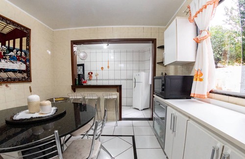 Petropolis Casa | Casa em Passo Fundo com Churrasqueira