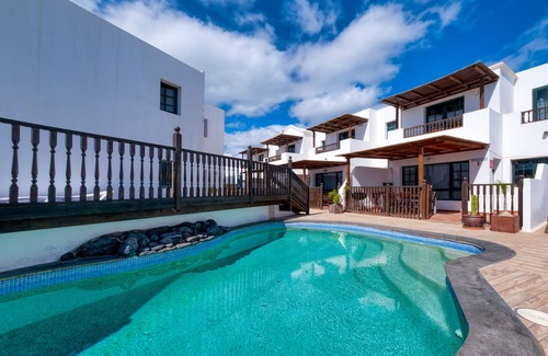 Punta Mujeres Chalet De Esquí | Casa Hibiscus - Shared Pool and BBQ - Close to Seafront Promenade By Lanzarote Vacation Homes