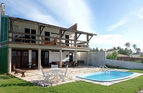 Taiba Casa | Casa Jangada - Incrível vista mar com Piscina e a melhor localização na Beira Mar da Taíba