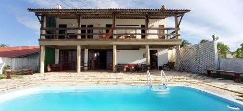 Taiba Casa | Casa Jangada - Incrível vista mar com Piscina e a melhor localização na Beira Mar da Taíba