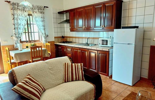 Barlovento Casa | Casa La Roseta: terraza, vistas al mar y piscina compartida