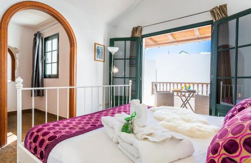 Punta Mujeres Casa | Casa Lila - Shared Pool - Close to Seafront Promenade - Sea Views from upper terrace