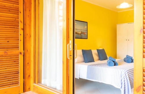 Villasimius Apartamento | Casa Madrid 2 - FREE WIFI - with patio