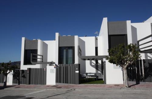 Caleta de Velez Casa | Casa Melocotón - Designhouse mit privatem Pool, direkt am Golfplatz