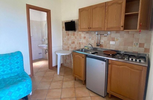 Marina di Puolo Casa | Casa Milli A: Un agradable apartamento ubicado en un promontorio frente al mar.