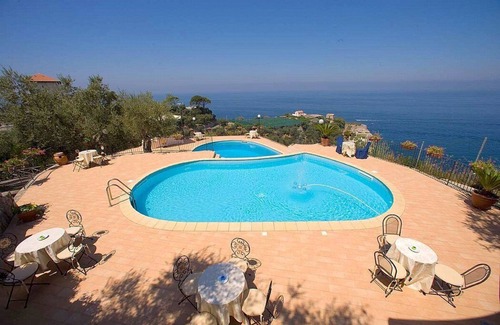 Marina di Puolo Casa | Casa Milli A: Un agradable apartamento ubicado en un promontorio frente al mar.