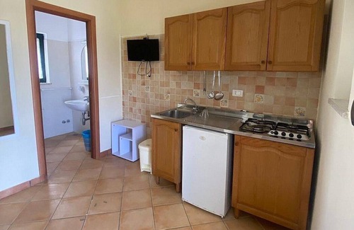 Marina di Puolo Casa | Casa Milli B: Un agradable apartamento ubicado en un promontorio frente al mar.