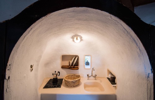 Alonnisos Old Town Otro | Molino de viento: un icono contemporáneo que combina tradición y elegancia.