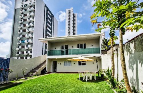 Madalena Apartamento | Casa moderna com jardim privativo