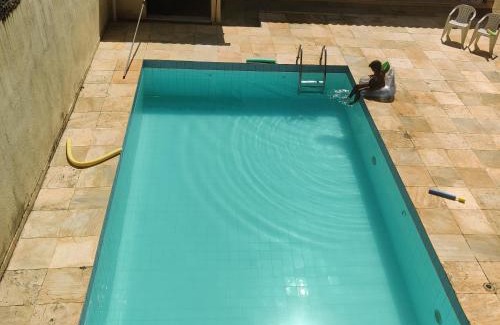 Coqueiral Casa | Casa muito espaçosa privativa com Piscina, Churrasqueira e área gourmet