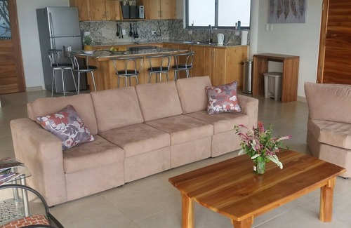Dominicalito Villa | Casa Naranja spacious home surrounded by tropical forest with superb bay view