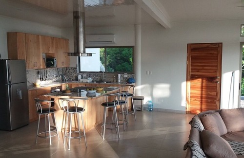 Dominicalito Villa | Casa Naranja spacious home surrounded by tropical forest with superb bay view
