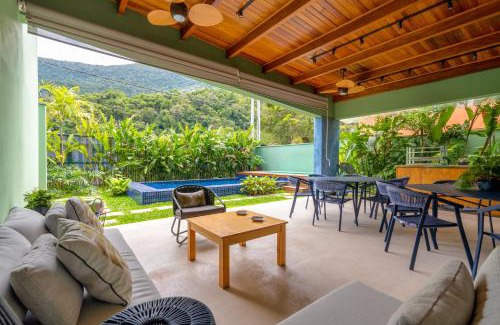 Guaeca Casa | Casa Patropi na Praia de Guaecá - condomínio fechado, piscina aquecida e internet 500mb