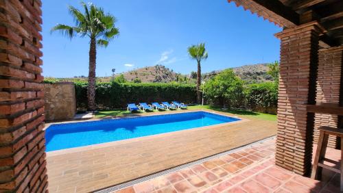Alora Chalet De Esquí | CASA PEPE Y MARI CON PISCINA