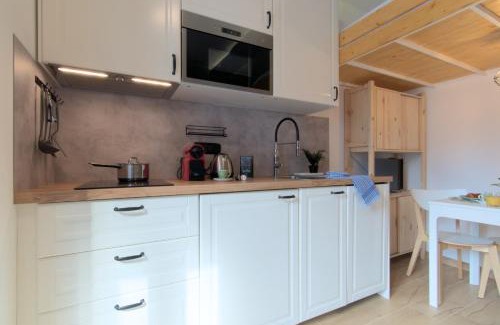 Aprica Apartamento | Casa Pino- Loft con giardino Magnolta