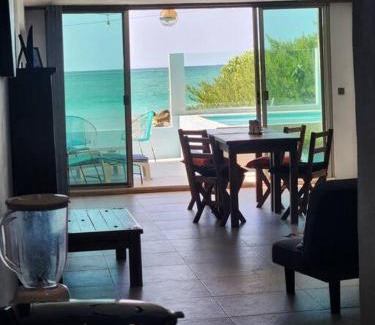 Puerto Yucalpetén Casa | Casa Rosa 2 bedroom beach fronted home with private pool