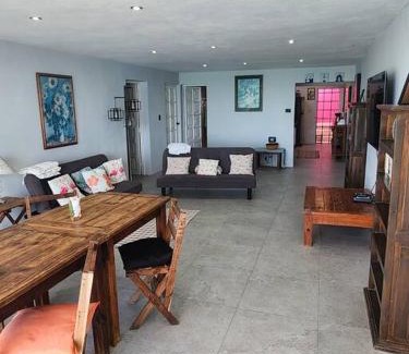 Puerto Yucalpetén Casa | Casa Rosa 2 bedroom beach fronted home with private pool