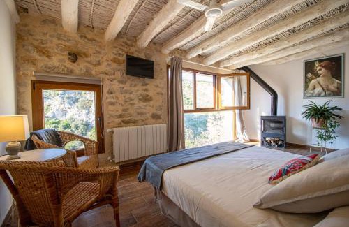 Benisili Casa | Casa rural Vall de Gallinera con Chimenea, piscina y jacuzzi DIANIA