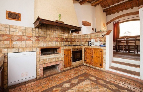 Castiglione d'Orcia Casa | Casa Salvia E: un apartamento en el estilo característico de la campiña toscana.