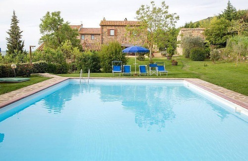 Castiglione d'Orcia Casa | Casa Salvia E: un apartamento en el estilo característico de la campiña toscana.