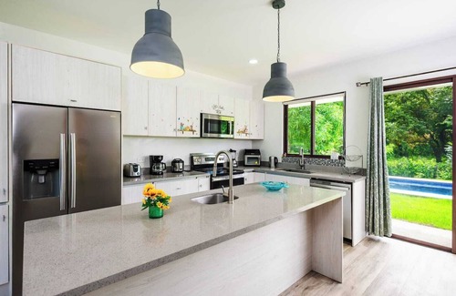 Junquillal Casa | Casa Tuga is a bright 4BR, 4BA home with a private pool (with kid-friendly area), Just a short walk to the beach and restaurants.
